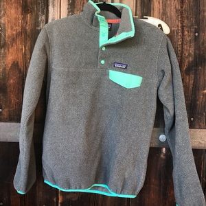 Brand new Patagonia fleece pull over sweater